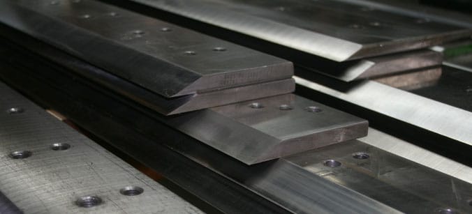 Paper cutter blade sharpening, grinding