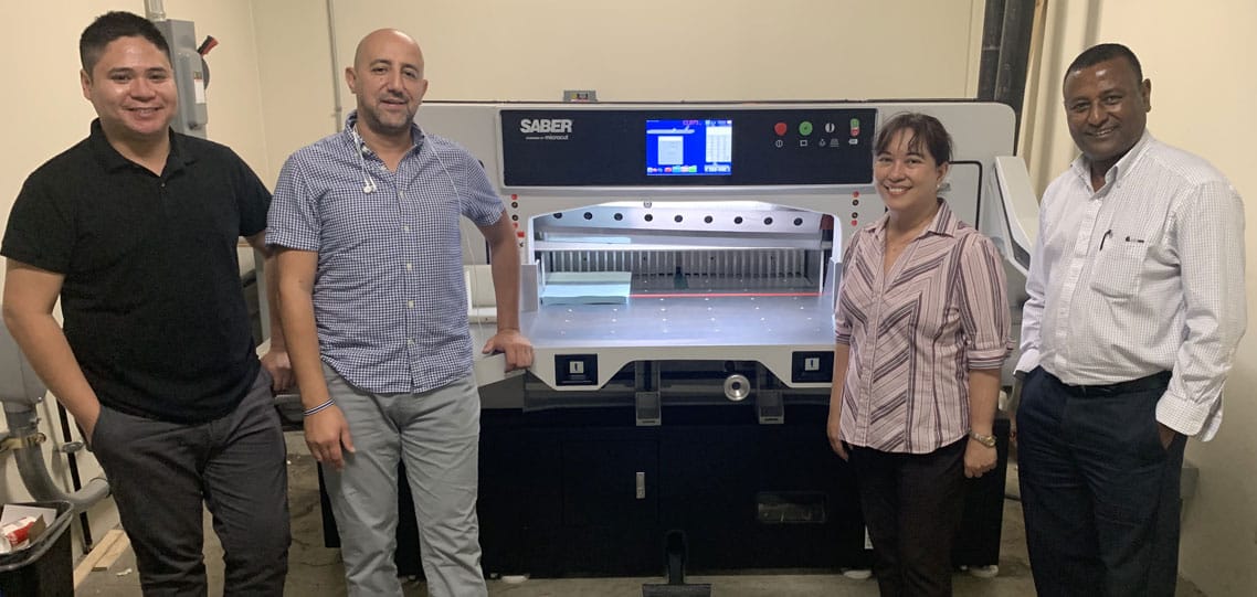 Alameda County Sheriff’s Office team members with their new 37-inch SABER X-15 paper cutter