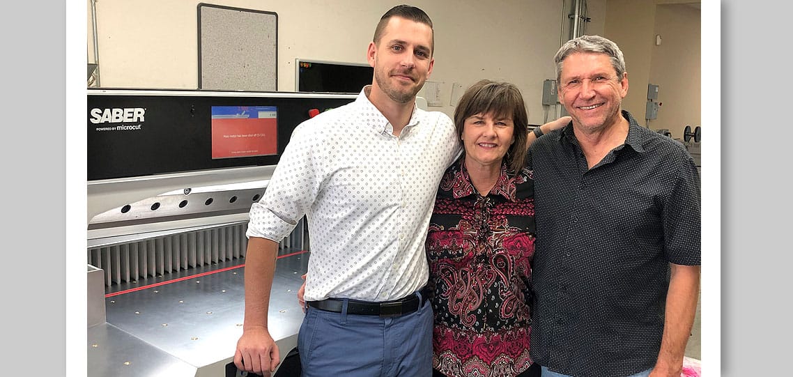 Three owners of a new SABER-X15 paper cutter