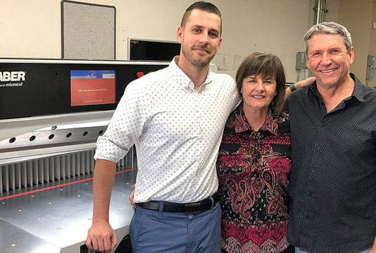 Three owners of a new SABER-X15 paper cutter