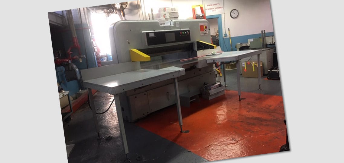 A reconditioned 61-inch Polar paper cutter at Albert Paper Products