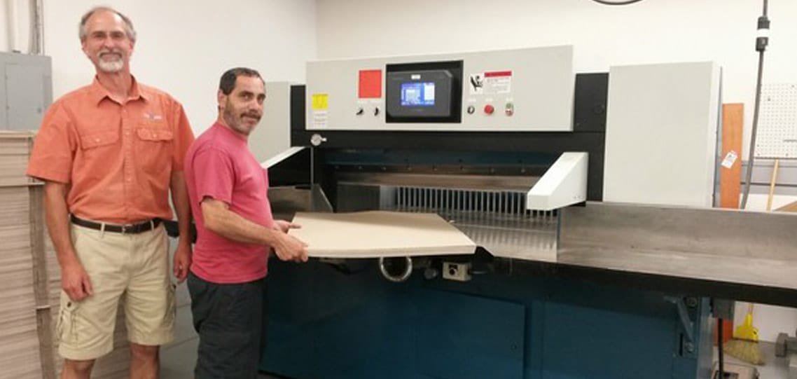 Working with a rebuilt 52 inch Lawson heavy duty paper cutter