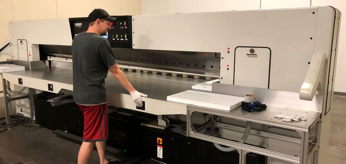 Large format paper cutter for large plastic sheets