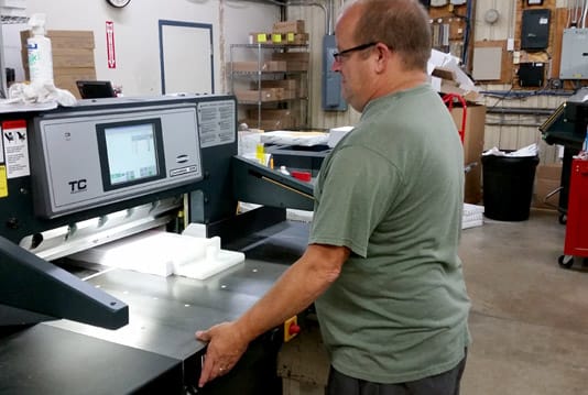 Rebuilt Challenge heavy duty paper cutter with air fed side table