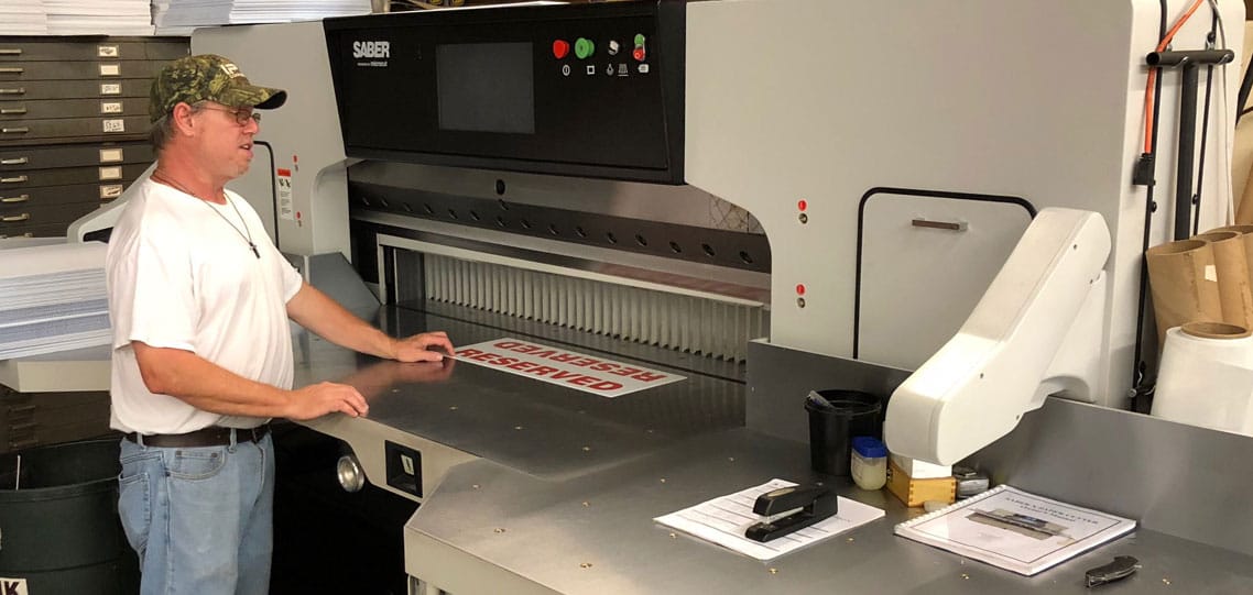 Farmer Signs new SABER industrial paper cutter