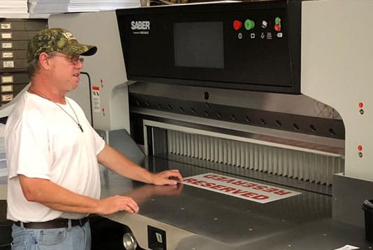 Farmer Signs new SABER industrial paper cutter